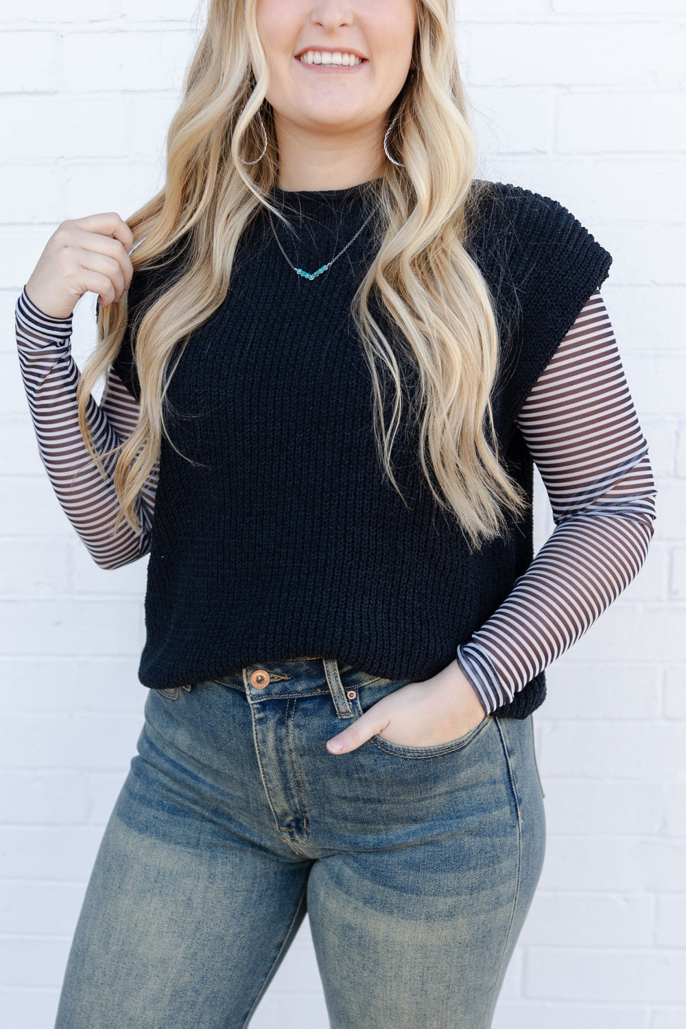 Black Sleeveless Sweater