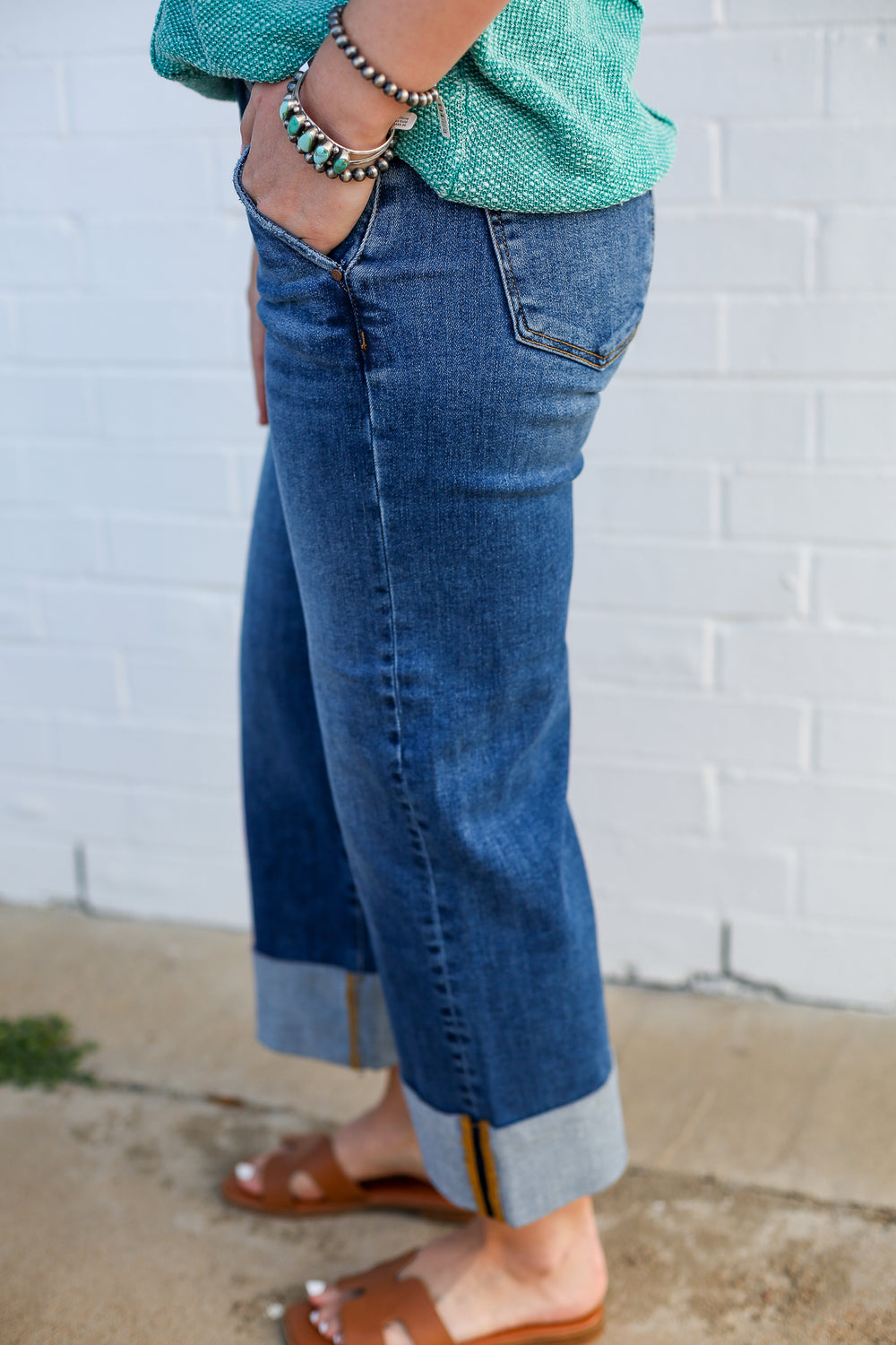 Mid Rise Medium Wash Wide Cuffed Jeans