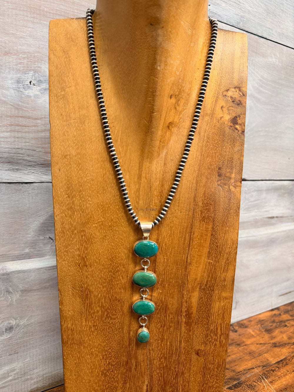 Oval Four Stone Drop Pendant