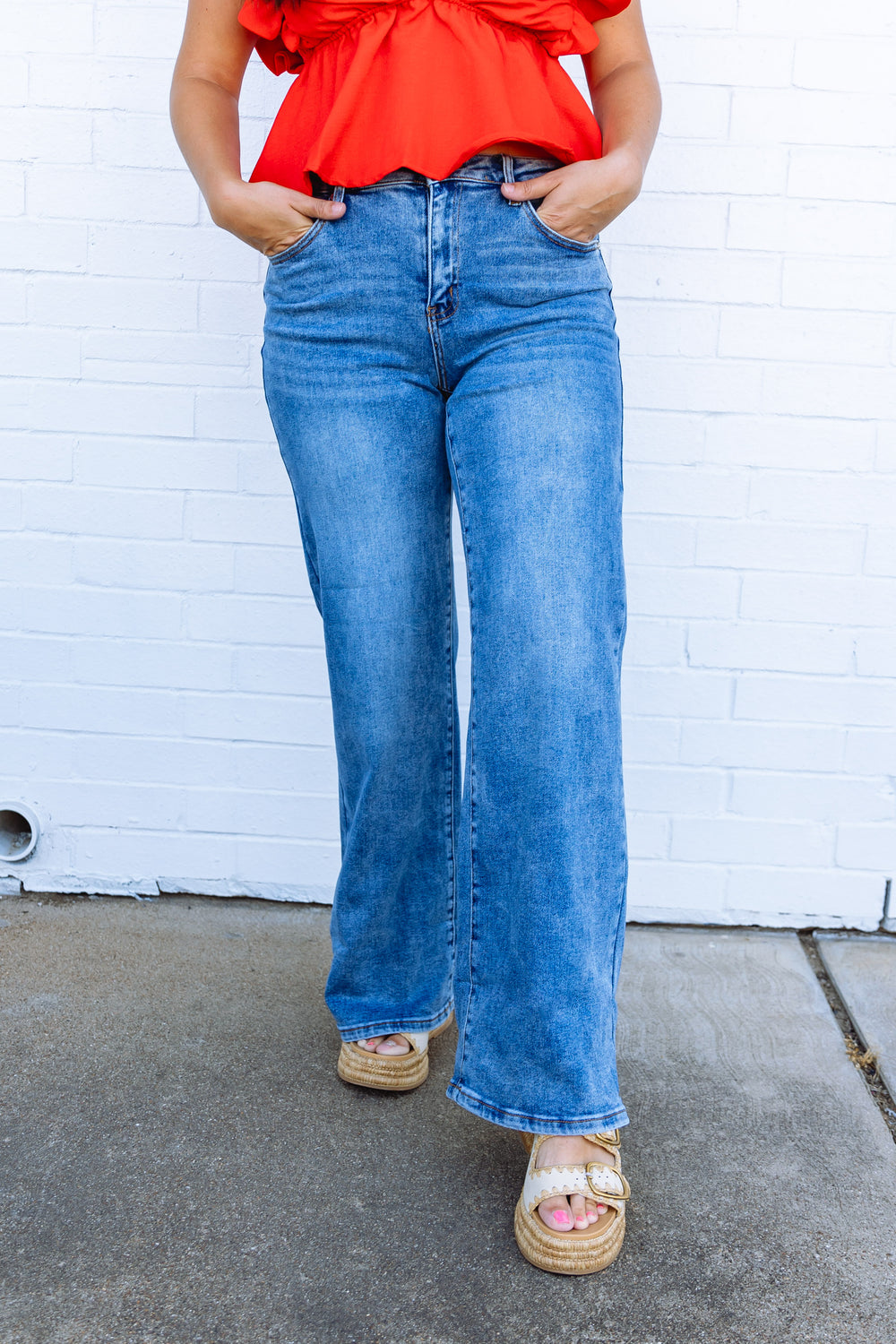 Sloan Mid Rise Wide Leg Jeans