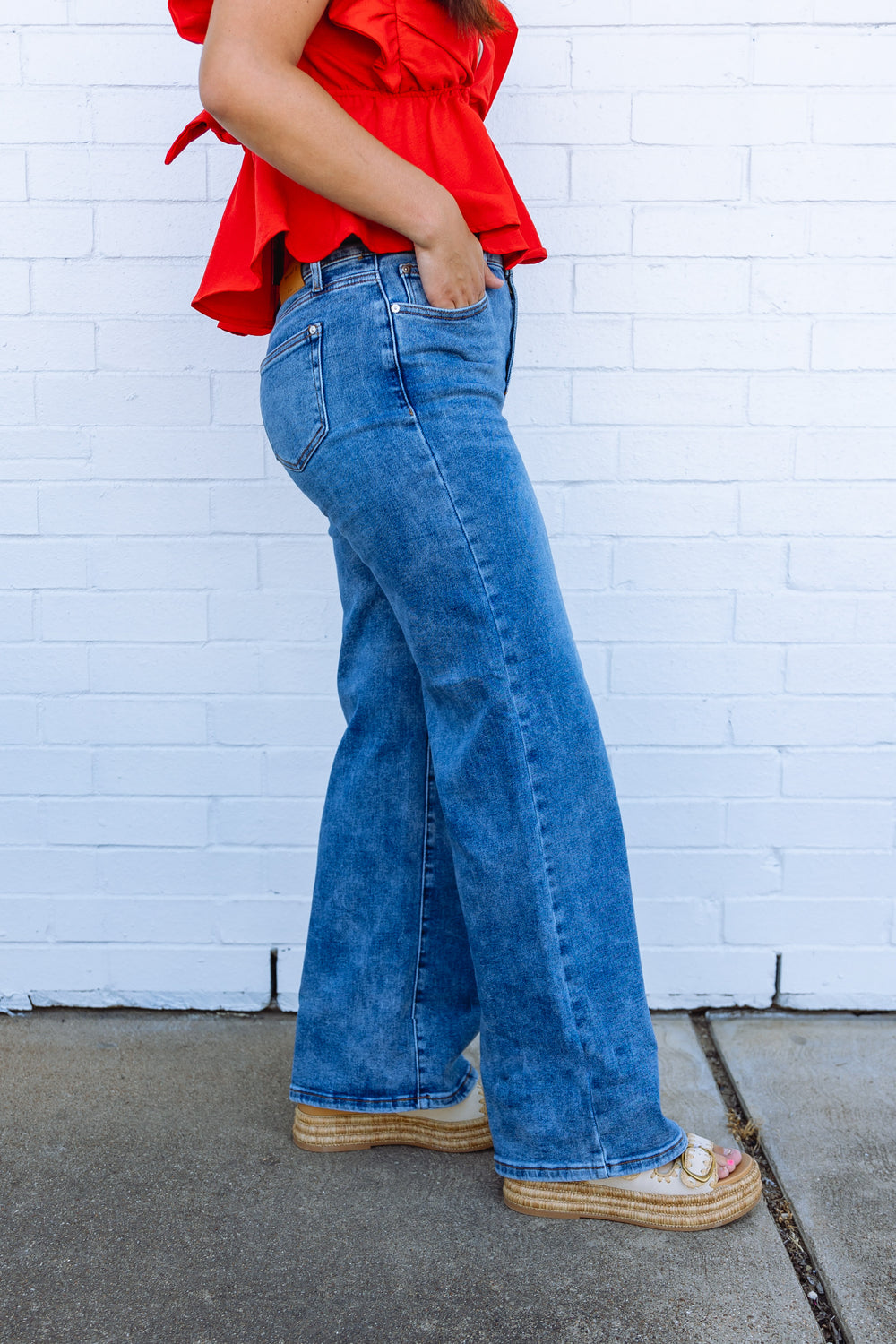 Sloan Mid Rise Wide Leg Jeans