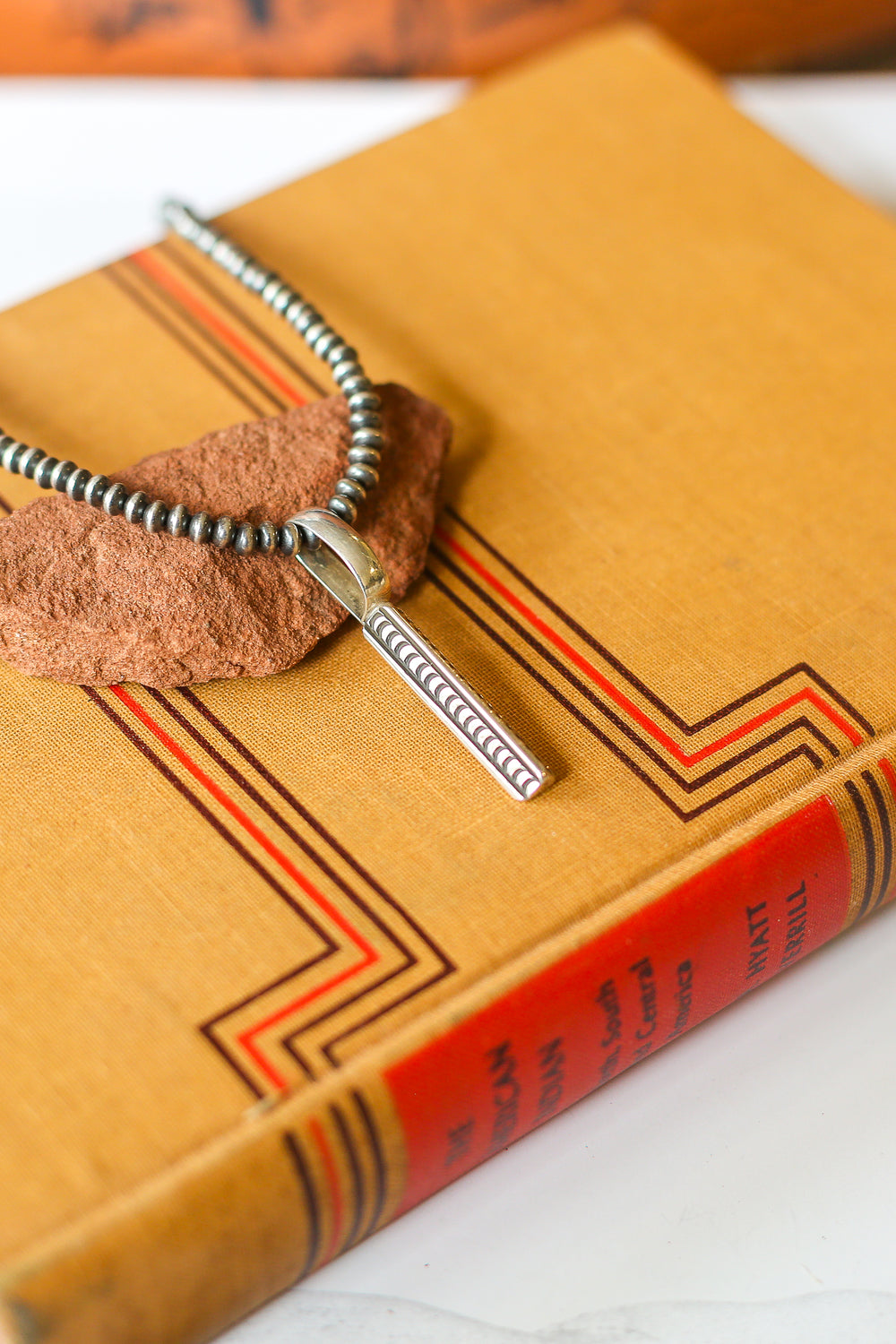 The Pyramid Stamped Pendant 1.0