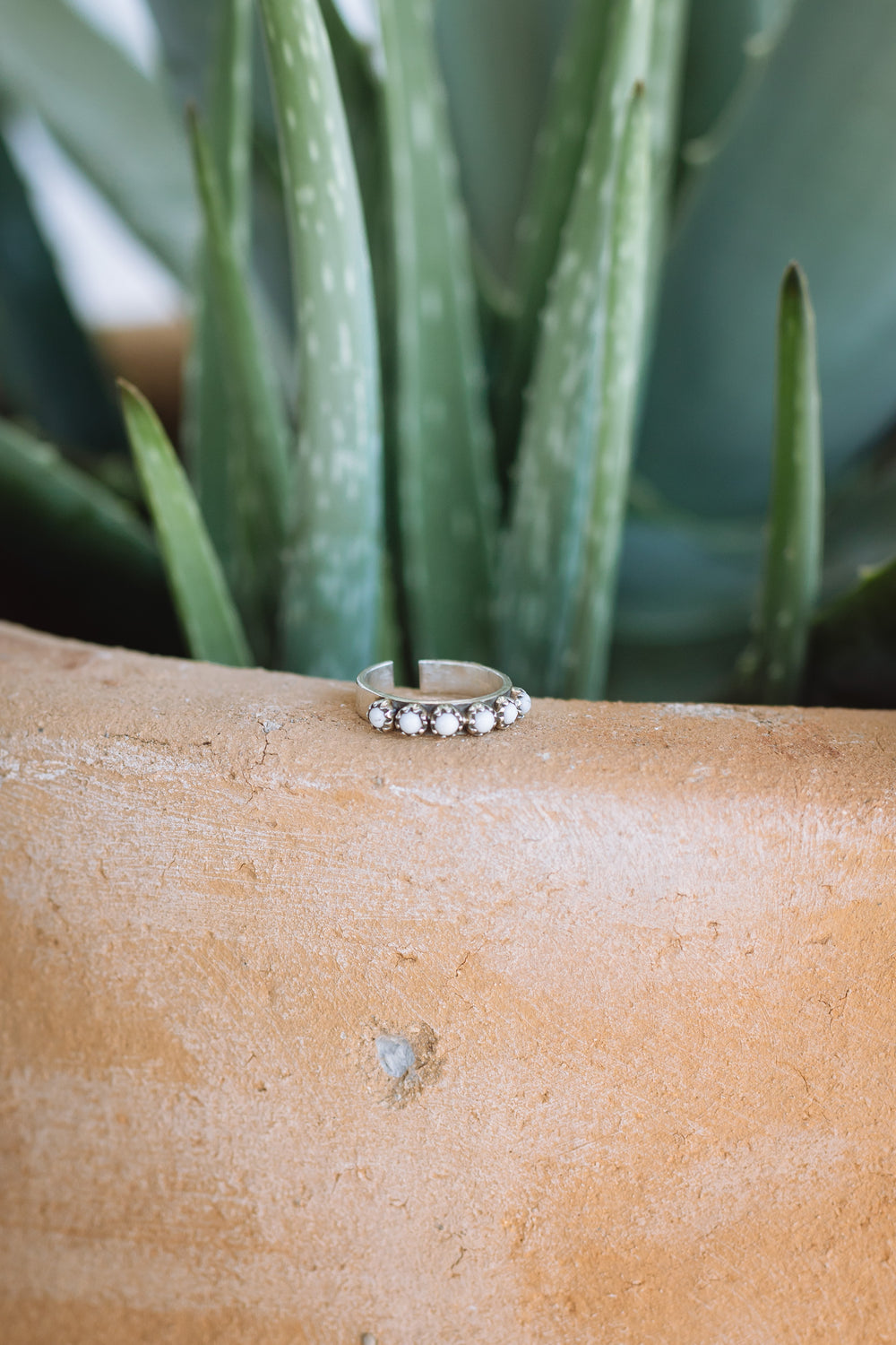 White 6 stone ring